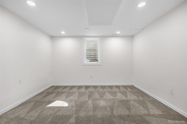 basement with carpet floors, recessed lighting, and baseboards