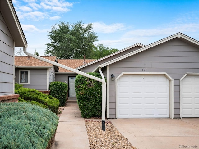 ranch-style home with a garage