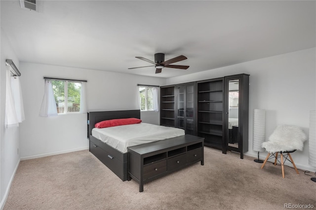 3629 W Custer Pl, Denver, CO 80219 - carpeted bedroom with baseboards and ceiling fan
