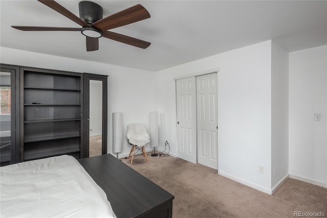 3629 W Custer Pl, Denver, CO 80219 - carpeted bedroom with a closet, baseboards, and a ceiling fan