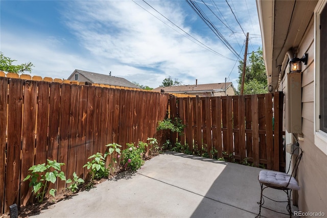 3629 W Custer Pl, Denver, CO 80219 - fenced backyard with a patio area