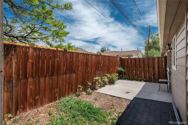 3629 W Custer Pl, Denver, CO 80219 - fenced backyard featuring a patio