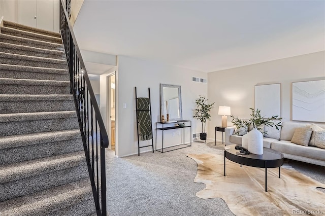 5511 S Lowell Blvd, Littleton, CO 80123 - living room with stairway and light carpet