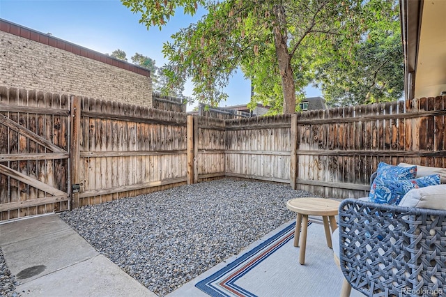 5511 S Lowell Blvd, Littleton, CO 80123 - fenced backyard featuring a patio area