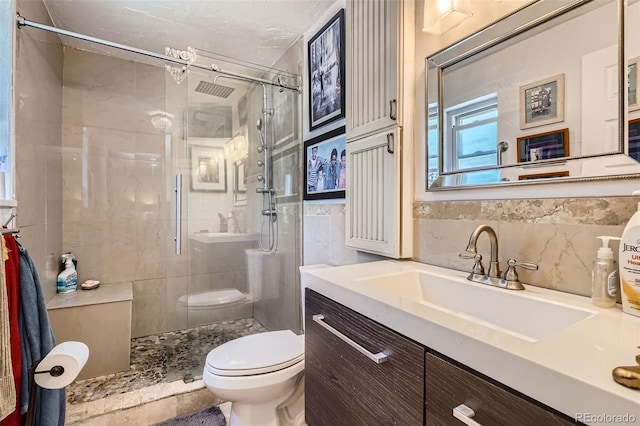 1676 S Fairplay St, Aurora, CO 80012 - full bath with toilet, a shower stall, and vanity