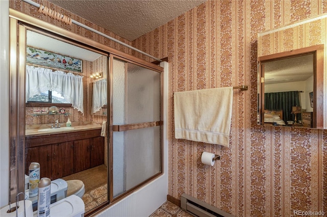 13440 County Rd 45, Coaldale, CO 81222 - full bathroom featuring wallpapered walls, a textured ceiling, vanity, and baseboard heating