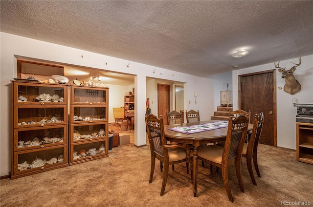 13440 County Rd 45, Coaldale, CO 81222 - dining space with light colored carpet and a textured ceiling