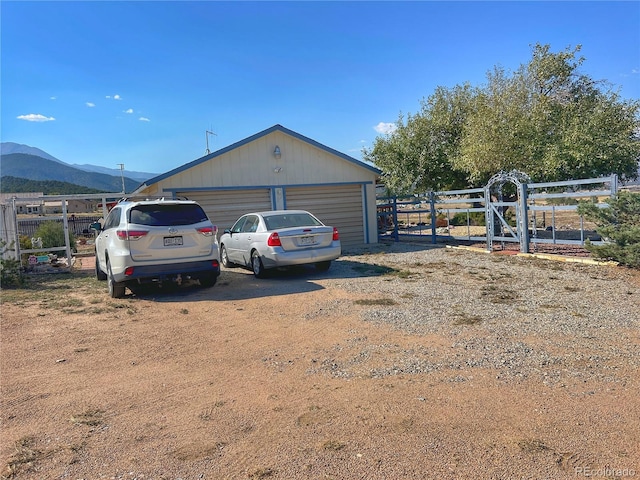 view of outbuilding with a mountain view