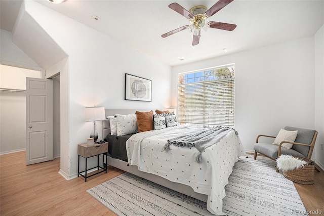 bedroom featuring ceiling fan and light hardwood / wood-style floors