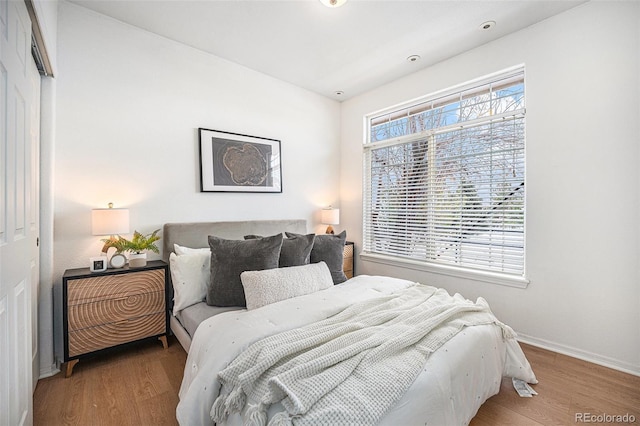 bedroom with light hardwood / wood-style flooring