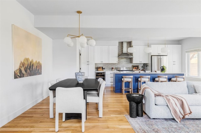 108 Arapahoe St, Golden, CO 80403 - dining area with light wood-style floors and wine cooler