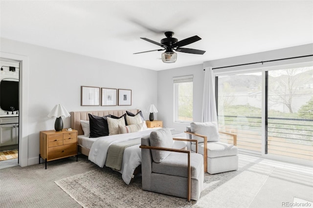 108 Arapahoe St, Golden, CO 80403 - carpeted bedroom with a ceiling fan, ensuite bath, baseboards, and a sink