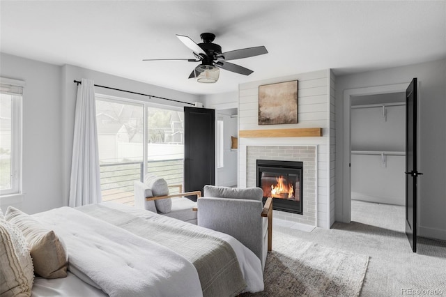108 Arapahoe St, Golden, CO 80403 - carpeted bedroom with a fireplace with flush hearth and ceiling fan