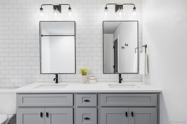 108 Arapahoe St, Golden, CO 80403 - bathroom with toilet, double vanity, and tile walls