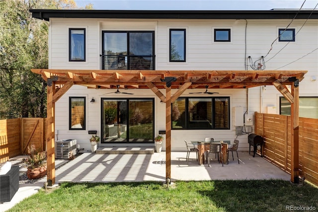 108 Arapahoe St, Golden, CO 80403 - back of property featuring ceiling fan, a pergola, a fenced backyard, and central air condition unit