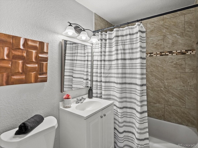 full bathroom with vanity, shower / bathtub combination with curtain, and toilet