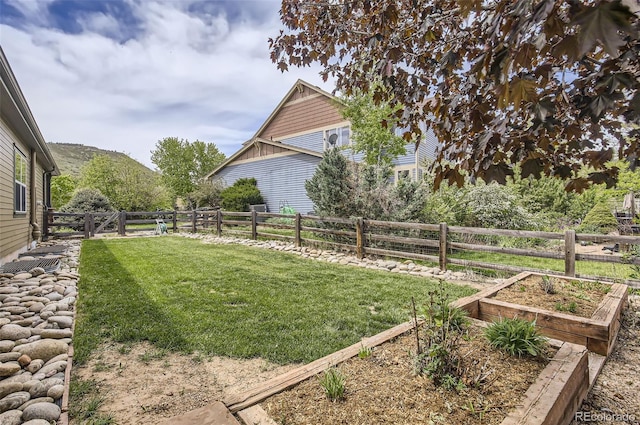 104 Noland Ct, Lyons, CO 80540 - view of yard featuring a vegetable garden