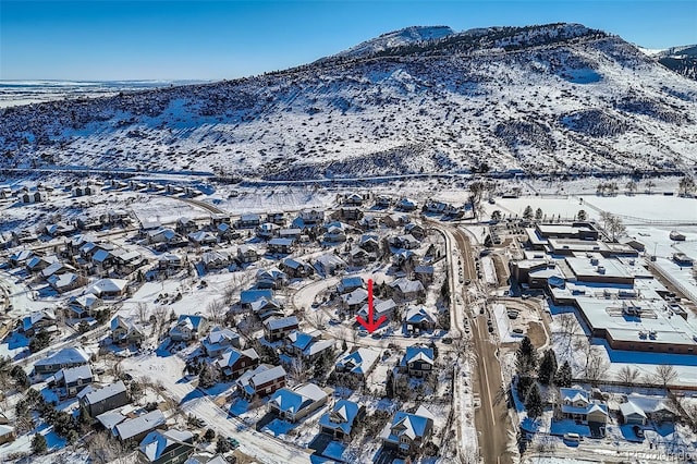 104 Noland Ct, Lyons, CO 80540 - snowy aerial view featuring a mountain view and a residential view