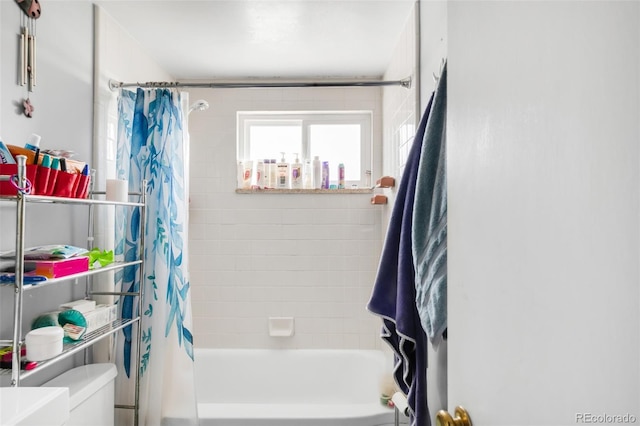 full bathroom with toilet and shower / tub combo with curtain