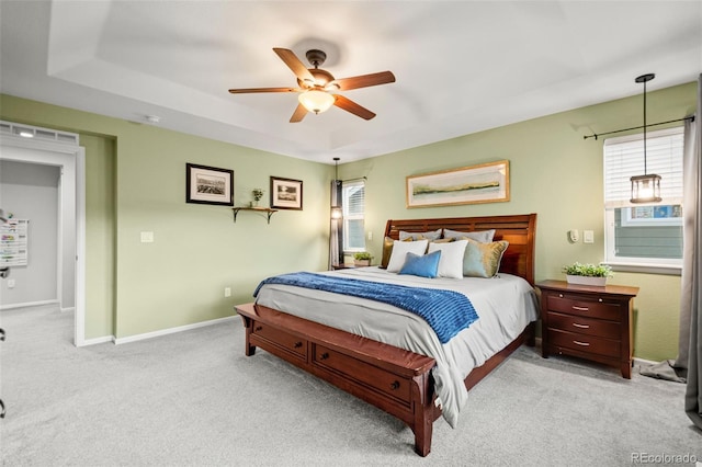 bedroom featuring ceiling fan, carpet floors, and baseboards