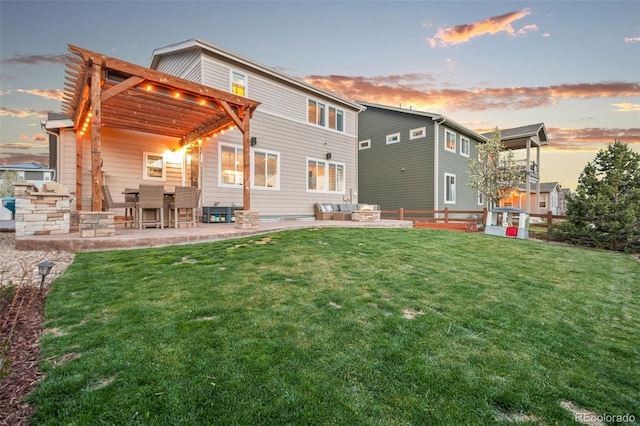 back of house with a yard, fence, and a patio area