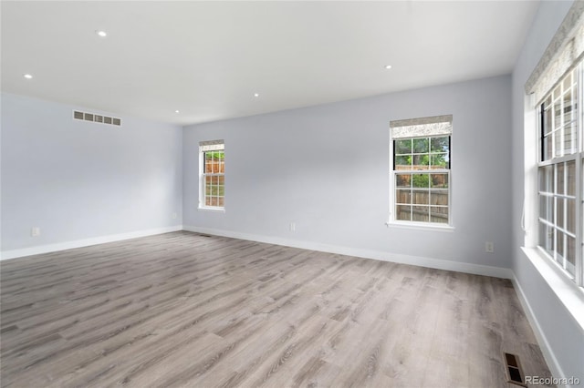 9451 W Hialeah Pl, Littleton, CO 80123 - spare room featuring wood finished floors, baseboards, and recessed lighting