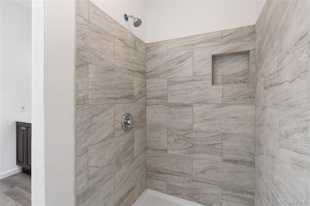 9451 W Hialeah Pl, Littleton, CO 80123 - full bathroom with tiled shower