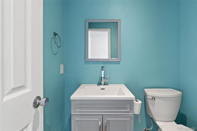 9451 W Hialeah Pl, Littleton, CO 80123 - bathroom featuring toilet and vanity