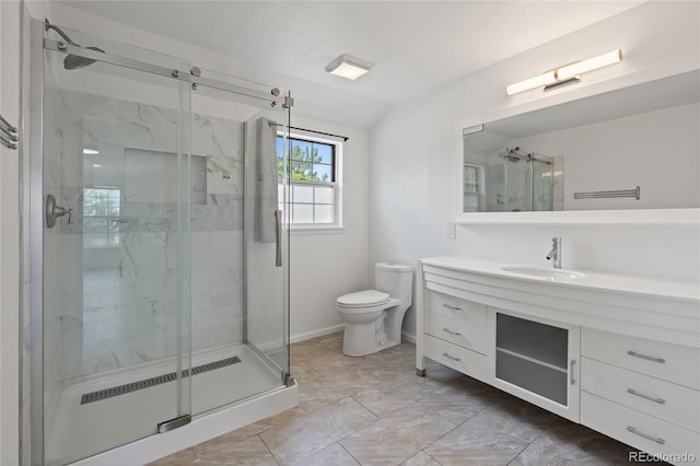 9451 W Hialeah Pl, Littleton, CO 80123 - bathroom featuring vanity, a marble finish shower, toilet, marble finish flooring, and baseboards