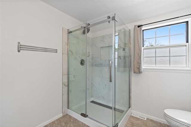 9451 W Hialeah Pl, Littleton, CO 80123 - full bathroom with baseboards, a marble finish shower, and toilet
