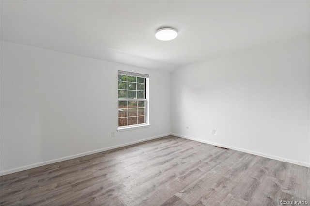 9451 W Hialeah Pl, Littleton, CO 80123 - empty room featuring wood finished floors and baseboards