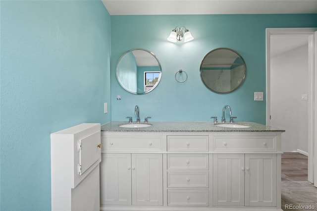 9451 W Hialeah Pl, Littleton, CO 80123 - bathroom featuring double vanity