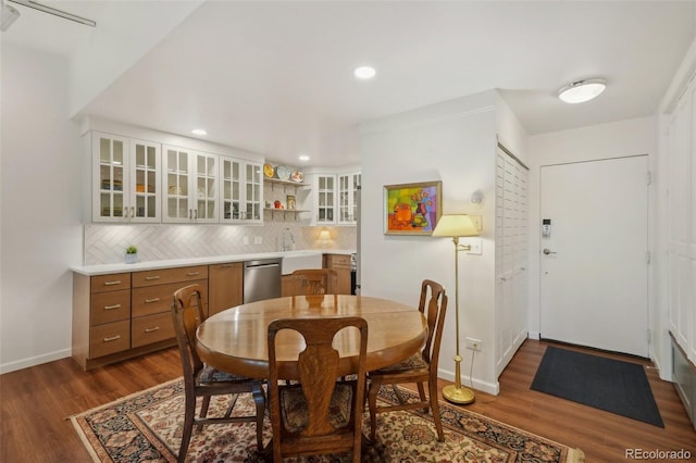 705 S Alton Way Unit 4D, Denver, CO 80247 - dining room with dark wood finished floors, baseboards, and recessed lighting