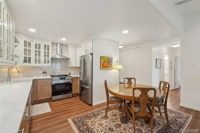 705 S Alton Way Unit 4D, Denver, CO 80247 - dining area with wood finished floors, baseboards, and recessed lighting