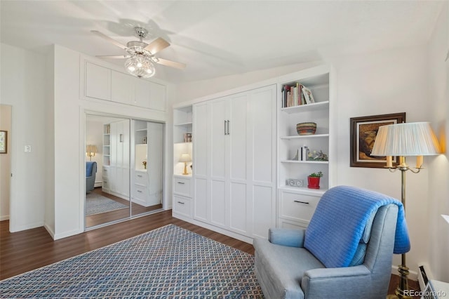 705 S Alton Way Unit 4D, Denver, CO 80247 - sitting room with dark wood-type flooring and ceiling fan