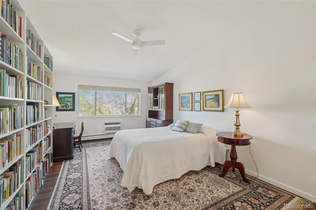 705 S Alton Way Unit 4D, Denver, CO 80247 - bedroom with wood finished floors, baseboards, vaulted ceiling, a baseboard radiator, and a ceiling fan