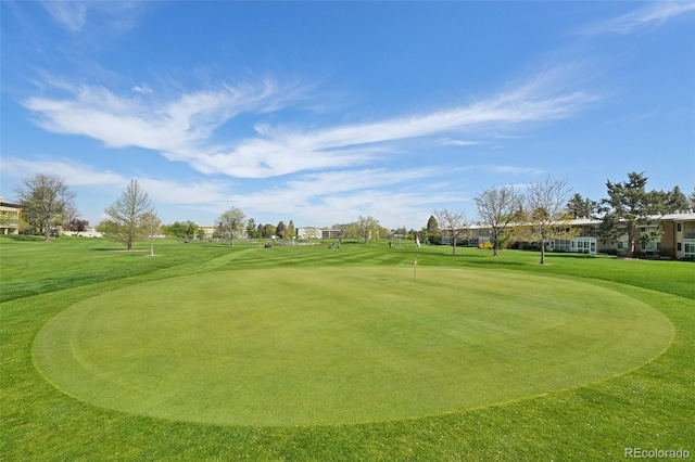 705 S Alton Way Unit 4D, Denver, CO 80247 - view of community featuring view of golf course, a yard, and a putting green
