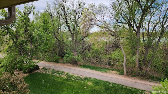 655 S Alton Way Unit 8D, Denver, CO 80247 - view of road with a view of trees