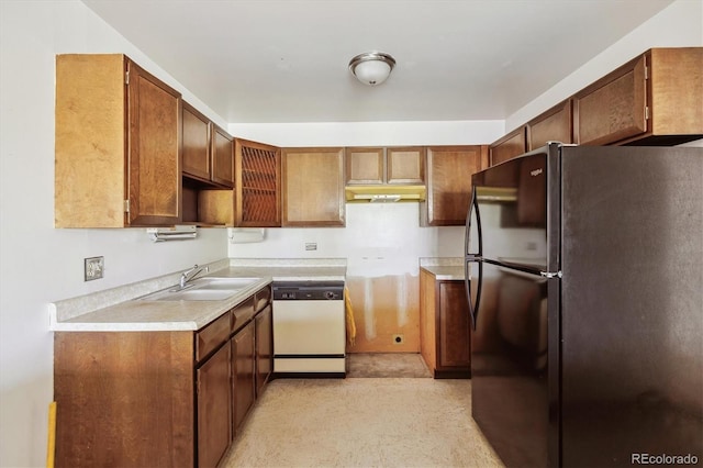 655 S Alton Way Unit 8D, Denver, CO 80247 - kitchen featuring freestanding refrigerator, white dishwasher, a sink, and brown cabinets