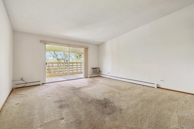 655 S Alton Way Unit 8D, Denver, CO 80247 - carpeted empty room featuring a baseboard radiator, baseboards, and a wall mounted AC
