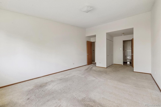 655 S Alton Way Unit 8D, Denver, CO 80247 - unfurnished bedroom with carpet floors and baseboards