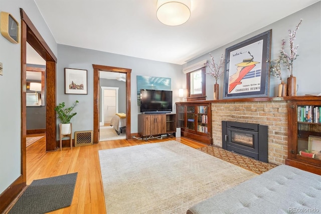 3044 W 40th Ave, Denver, CO 80211 - living area with wood finished floors and a fireplace