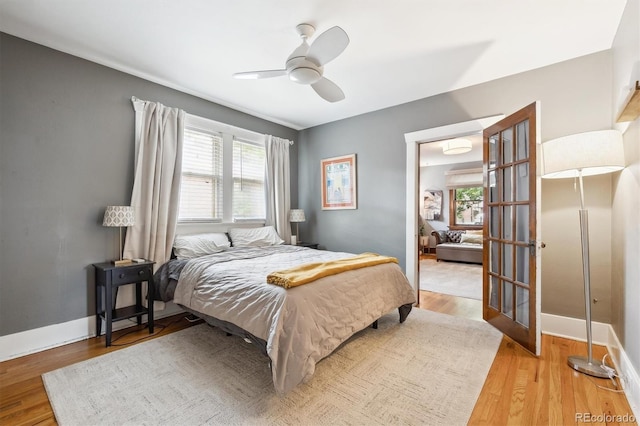 3044 W 40th Ave, Denver, CO 80211 - bedroom with light wood-style flooring and a ceiling fan