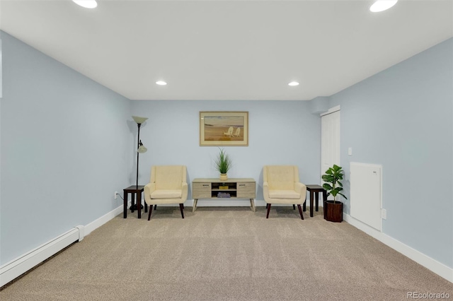 living area featuring baseboard heating, carpet flooring, recessed lighting, and baseboards
