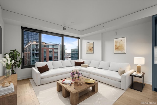 1750 Wewatta St Unit 1227, Denver, CO 80202 - living area featuring light wood-style floors