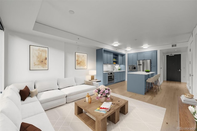 1750 Wewatta St Unit 1227, Denver, CO 80202 - living room featuring light wood finished floors