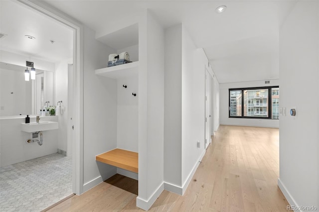 1750 Wewatta St Unit 1227, Denver, CO 80202 - mudroom featuring wood finished floors and recessed lighting