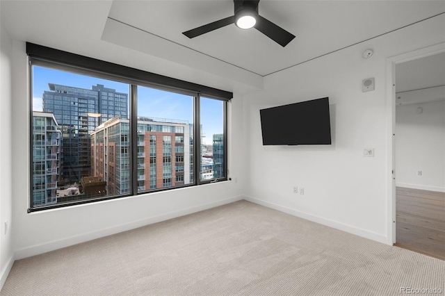 1750 Wewatta St Unit 1227, Denver, CO 80202 - unfurnished room with carpet, a ceiling fan, and a smoke detector