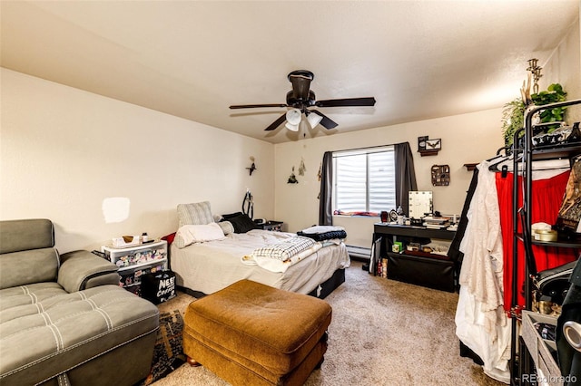 bedroom featuring light carpet, baseboard heating, and ceiling fan