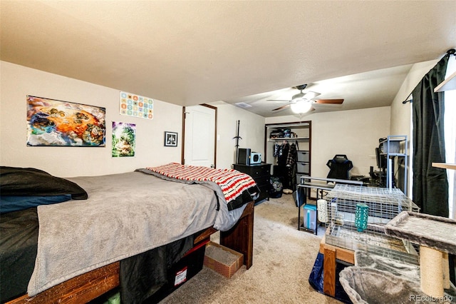 bedroom featuring ceiling fan and light colored carpet